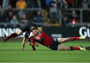21 November 2014; Ashley Smith, Newport Gwent Dragons, is tackled by Cathal Sheridan, Munster. Guinness PRO12, Round 8, Newport Gwent Dragons v Munster, Rodney Parade, Newport, Wales. Picture credit: Steve Pope / SPORTSFILE