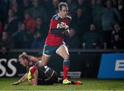 21 November 2014; Andrew Smith, Munster, evades the tackle of Ashley Smith, Newport Gwent Dragons, on his way to scoring his side's second try of the game. Guinness PRO12, Round 8, Newport Gwent Dragons v Munster, Rodney Parade, Newport, Wales. Picture credit: Steve Pope / SPORTSFILE