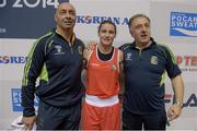 23 November 2014; Katie Taylor, Ireland, celebrates after beating Junhua Yin, China, in her semi-final bout with coaches Pete Taylor, left, and Zaur Antia. 2014 AIBA Elite Women's World Boxing Championships, Jeju, Korea. Photo by Sportsfile