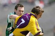 8 July 2007; George Sunderland, Wexford, in action against James Sherry, Fermanagh. Bank of Ireland All-Ireland Senior Football Championship Qualifier, Round 1, Fermanagh v Wexford, St Tighearnach's Park, Clones, Co. Monaghan. Picture credit: Oliver McVeigh / SPORTSFILE