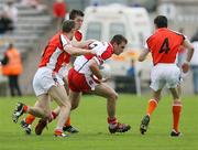 8 July 2007; James Conway, Derry, in action against Paul McGrane, Stephen Kernan and Andy Mallon, Armagh. Bank of Ireland All-Ireland Senior Football Championship Qualifier, Round 1, Armagh v Derry, St Tighearnach's Park, Clones, Co. Monaghan. Picture credit: Oliver McVeigh / SPORTSFILE