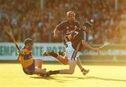 7 July 2007; Jonathan Clancy, Clare, is shouldered by Ger Mahon, Galway. Guinness All-Ireland Senior Hurling Championship Qualifier, Group 1A, Round 2, Clare v Galway, Cusack Park, Ennis, Co. Clare. Picture credit: Brendan Moran / SPORTSFILE