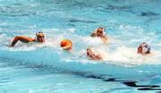 10 July 2007; Ireland's Eoin Nolan, center, fights for the ball against three British players. European B Waterpolo Championships, Pool B, Manchester Aquatic Centre, Manchester, England. Picture credit Paul Greenwood / SPORTSFILE