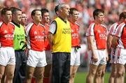 8 July 2007; Armagh fitness coach, John McCloskey, centre, stands with the team during the National Anthem. Bank of Ireland All-Ireland Senior Football Championship Qualifier, Round 1, Armagh v Derry, St Tighearnach's Park, Clones, Co. Monaghan. Picture credit: Oliver McVeigh / SPORTSFILE