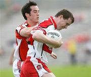 8 July 2007; Barry McGoldrick, Derry, in action against Aaron Kernan, Armagh. Bank of Ireland All-Ireland Senior Football Championship Qualifier, Round 1, Armagh v Derry, St Tighearnach's Park, Clones, Co. Monaghan. Picture credit: Oliver McVeigh / SPORTSFILE