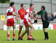 8 July 2007; Derry's James Conway disputes Referee Eugene Murtagh's decision. Bank of Ireland All-Ireland Senior Football Championship Qualifier, Round 1, Armagh v Derry, St Tighearnach's Park, Clones, Co. Monaghan. Picture credit: Oliver McVeigh / SPORTSFILE
