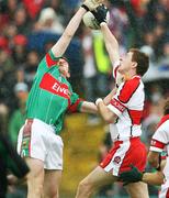 14 July 2007; Gerard O'Kane, Derry, in action against David Brady, Mayo. Bank of Ireland All-Ireland Football Championship Qualifier, Round 2, Derry v Mayo, Celtic Park, Derry. Picture credit: Oliver McVeigh / SPORTSFILE