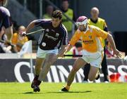 14 July 2007; Iarla Tannian, Galway, in action against Michael McCambridge, Antrim. Guinness All-Ireland Hurling Championship Qualifier, Group 1A, Round 3, Galway v Antrim, Pearse Stadium, Salthill, Galway. Picture credit: Kieran Clancy / SPORTSFILE