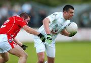 14 July 2007; Padraig O'Neill, Kildare, in action against Alan Page, Louth. Bank of Ireland All-Ireland Football Championship Qualifier, Round 2, Kildare v Louth, St. Conleth's Park, Newbridge, Co. Kildare. Picture credit: Matt Browne / SPORTSFILE