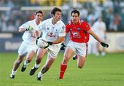 14 July 2007; Ken Donnelly, Kildare, in action against Peter McGinnity, Louth. Bank of Ireland All-Ireland Football Championship Qualifier, Round 2, Kildare v Louth, St. Conleth's Park, Newbridge, Co. Kildare. Picture credit: Matt Browne / SPORTSFILE