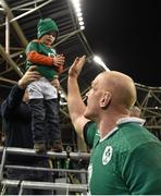 22 November 2014; Ireland's Paul O'Connell gives a 'high five' to a young supporter as he leaves the pitch after the game. Guinness Series, Ireland v Australia. Aviva Stadium, Lansdowne Road, Dublin. Picture credit: Brendan Moran / SPORTSFILE