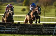 23 November 2014; Pencilhimin, right, with Danny Benson up, jump the last ahead of Gallant Oscar, with Ruby Walsh up, on their way to winning the Proudstown Handicap Hurdle. Navan Racecourse, Navan, Co. Meath. Picture credit: Barry Cregg / SPORTSFILE