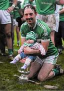 23 November 2014; Kilmallock's Paudie O'Brien, celebrates with the cup, along with his five-month-old daughter Fiadh O'Brien, after victory over Cratloe. AIB Munster GAA Hurling Senior Club Championship Final, Kilmallock v Cratloe. Gaelic Grounds, Limerick. Picture credit: Diarmuid Greene / SPORTSFILE