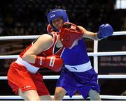 23 November 2014; Katie Taylor, Ireland, left, exchanges punches with Junhua Yin, China, during their semi-final bout. 2014 AIBA Elite Women's World Boxing Championships, Jeju, Korea. Photo by Sportsfile