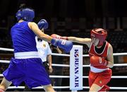 23 November 2014; Katie Taylor, Ireland, right, exchanges punches with Junhua Yin, China, during their semi-final bout. 2014 AIBA Elite Women's World Boxing Championships, Jeju, Korea. Photo by Sportsfile