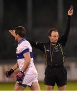 23 November 2014; Ger Brennan, St Vincent's, receives a black card from referee John Hickey. AIB Leinster GAA Football Senior Club Championship Semi-Final, St Vincent's v Garrycastle. Parnell Park, Dublin. Picture credit: Stephen McCarthy / SPORTSFILE