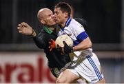 23 November 2014; Ruairi Treanor, St Vincent's, is tackled by Garrycastle goalkeeper Cathal Mullin resulting in referee John Hickey giving the goalkepeer a black card and awarding St Vincent's a penalty. AIB Leinster GAA Football Senior Club Championship Semi-Final, St Vincent's v Garrycastle. Parnell Park, Dublin. Picture credit: Stephen McCarthy / SPORTSFILE
