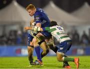 23 November 2014; Tom Denton, Leinster, is tackled by Ludovico Nitoglia, hidden, and Alberto Lucchese, Benetton Treviso. Guinness PRO12, Round 8, Benetton Treviso v Leinster. Stadio Comunale Di Monigo, Treviso, Italy. Picture credit: Pat Murphy / SPORTSFILE