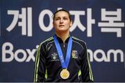 24 November 2014; Katie Taylor, Ireland, stands for the National Anthem with her gold medal after beating Yana Allekseevna, Azerbaijan, in their 60kg Light Weight Final. 2014 AIBA Elite Women's World Boxing Championships, Jeju, Korea. Photo by Sportsfile