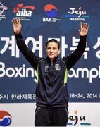 24 November 2014; Katie Taylor, Ireland, on the podium prior to receiving her gold medal. 2014 AIBA Elite Women's World Boxing Championships, Jeju, Korea. Photo by Sportsfile