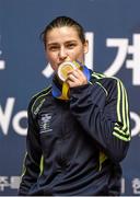 24 November 2014; Katie Taylor, Ireland, celebrates with her gold medal after beating Yana Allekseevna, Azerbaijan, in their 60kg Light Weight Final. 2014 AIBA Elite Women's World Boxing Championships, Jeju, Korea. Photo by Sportsfile