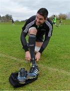 24 November 2014; Munster's Billy Holland ties his boot laces before squad training ahead of Friday's Guinness PRO12, Round 9, match against Ulster. Munster Rugby Squad Training, University of Limerick, Limerick. Picture credit: Diarmuid Greene / SPORTSFILE
