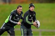 24 November 2014; Munster's Ian Keatley, supported by team-mate Denis Hurley, during squad training ahead of Friday's Guinness PRO12, Round 9, match against Ulster. Munster Rugby Squad Training, University of Limerick, Limerick. Picture credit: Diarmuid Greene / SPORTSFILE