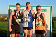 23 November 2014; On the podium after the Under 23 Mens race are from left, second placed Brandon Hargreaves, Clonliffe Harriers A.C., first placed Liam Brady, Tullamore Harriers A.C., and third placed Ryan McDermott, Annadale Striders A.C., at the GloHealth Inter County & Juvenile Even Age Cross Country Championships. Dundalk Institute of Technology, Dundalk, Co. Louth. Picture credit: Ramsey Cardy / SPORTSFILE