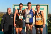 23 November 2014; On the podium after the Under 23 Mens race are from left, Jim Dowdall, CEO of GloHealth, second placed Brandon Hargreaves, Clonliffe Harriers A.C., first placed Liam Brady, Tullamore Harriers A.C., and third placed Ryan McDermott, Annadale Striders A.C., at the GloHealth Inter County & Juvenile Even Age Cross Country Championships. Dundalk Institute of Technology, Dundalk, Co. Louth. Picture credit: Ramsey Cardy / SPORTSFILE
