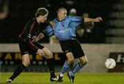 22 March 2004; Tony Grant of Bohemians in action against Stephen Paisley of Longford Town during the Eircom League Premier Division match between Longford Town and Bohemians at Flancare Park in Longford. Photo by David Maher/Sportsfile