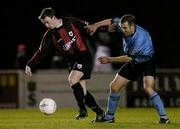22 March 2004; Philip Keogh of Longford Town in action against Stephen Caffrey of Bohemians during the Eircom League Premier Division match between Longford Town and Bohemians at Flancare Park in Longford. Photo by David Maher/Sportsfile