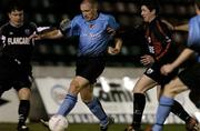 22 March 2004; Glen Crowe of Bohemians in action against Stephen O'Brien, left, and Alan Murphy of Longford Town during the Eircom League Premier Division match between Longford Town and Bohemians at Flancare Park in Longford. Photo by David Maher/Sportsfile