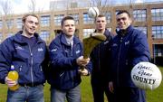 23 March 2004; Dessie Farrell, Chief Executive, Carphone Warehouse Sponsored Gaelic Players' Association, shows off his hurling skills to players Simon Gerard, left, of Louth, Owen Lennon of Monaghan, second from right, and Paul Casey of Dublin, right, who are three of the twelve emerging stars of gaelic games who were presented with scholarships from funds generated through the sales of Club Energise at DCU in Glasnevin, Dublin. Photo by David Maher/Sportsfile