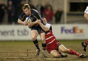 26 March 2004; James Norton of Leinster Lions is tackled by Kevin Utterson of The Borders during the Celtic League Division 1 match between Leinster Lions and The Borders at Donnybrook Stadium in Dublin. Photo by Pat Murphy/Sportsfile