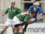 27 March 2004; Matteo Paoli of Italy is tackled by Dale Black of Ireland during an U18 Youth Rugby International match between Ireland and Italy at Donnybrook Stadium in Dublin. Photo by Damien Eagers/Sportsfile