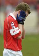 28 March 2004; Conor McCarthy of Cork reacts to a missed opportunity following the Allianz Football League Division 1A match between Tyrone and Cork at Healy Park in Omagh, Tyrone. Photo by Ray McManus/Sportsfile