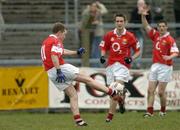 28 March 2004; Conor McCarthy of Cork has a shot on goal, which subsequently went wide, in the final moments of the Allianz Football League Division 1A match between Tyrone and Cork at Healy Park in Omagh, Tyrone. Photo by Ray McManus/Sportsfile