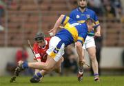 28 March 2004; John Carroll of Tipperary in action against John Gardiner of Cork during the Allianz Hurling League Division 1B match between Cork and Tipperary at Pairc Ui Chaoimh in Cork. Photo by Brendan Moran/Sportsfile