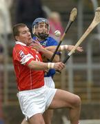 28 March 2004; Diarmuid O'Sullivan of Cork in action against Noel Moloney of Tipperary during the Allianz Hurling League Division 1B match between Cork and Tipperary at Pairc Ui Chaoimh in Cork. Photo by Brendan Moran/Sportsfile