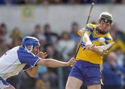 28 March 2004; Niall Gilligan of Clare in action against Declan Prendergast of Waterford during the Allianz Hurling League match between Clare and Waterford at Cusack Park in Ennis, Clare. Photo by Damien Eagers/Sportsfile