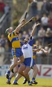 28 March 2004; Alan Markham of Clare in action against Eoin Murphy of Waterford during the Allianz Hurling League match between Clare and Waterford at Cusack Park in Ennis, Clare. Photo by Damien Eagers/Sportsfile