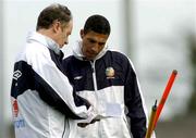 30 March 2004; Assistant coach Chris Hughton, right, in conversation with manager Brian Kerr during a Republic of Ireland Squad Training Session at the Carlisle Grounds in Bray, Wicklow. Photo by Pat Murphy/Sportsfile