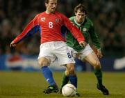 31 March 2004; Roman Tyce of Czech Republic in action against Kevin Kilbane of Republic of Ireland during an International Friendly between Republic of Ireland and Czech Republic at Lansdowne Road in Dublin. Photo by Pat Murphy/Sportsfile