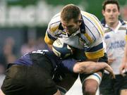 2 April 2004; Ben Gissing of Leinster Lions is tackled by Andrew Henderson of Glasgow Rugby during the Celtic League Division 1 match between Leinster Lions and Glasgow Rugby at Donnybrook Stadium in Dublin. Photo by Matt Browne/Sportsfile