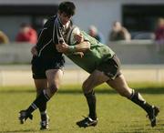 3 April 2004; Adrian Durston of Neath Swansea is tackled by Peter Bracken of Connacht during the Celtic League Division 1 match between Connacht and Neath Swansea at the Sportsground in Galway. Photo by Matt Browne/Sportsfile