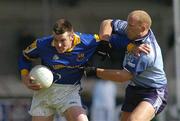 4 April 2004; Liam Keenan of Longford in action against Shane Ryan of Dublin during the Allianz Football League Division 1A Round 7 match between Dublin and Longford at Parnell Park in Dublin. Photo by Pat Murphy/Sportsfile