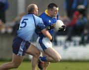 4 April 2004; John Kenny of Longford in action against Shane Ryan of Dublin during the Allianz Football League Division 1A Round 7 match between Dublin and Longford at Parnell Park in Dublin. Photo by Pat Murphy/Sportsfile