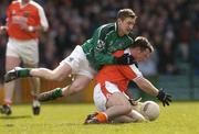 4 April 2004; Justin McNulty of Armagh in action against Eoin Keating of Limerick during the Allianz Football League Division 1B Round 7 match between Limerick and Armagh at the Gaelic Grounds in Limerick. Photo by David Maher/Sportsfile