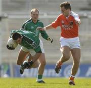 4 April 2004; John Galvin of Limerick in action against Paddy McKeever of Armagh during the Allianz Football League Division 1B Round 7 match between Limerick and Armagh at the Gaelic Grounds in Limerick. Photo by David Maher/Sportsfile