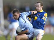4 April 2004; Paul Casey of Dublin in action against David Barden of Longford during the Allianz Football League Division 1A Round 7 match between Dublin and Longford at Parnell Park in Dublin. Photo by Pat Murphy/Sportsfile
